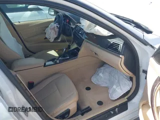 2014 BMW 3 Series 328i xDrive with VIN WBA3B3G51ENR81859, listed as a IAAI auction lot 41828729 with 129,498 mi miles. Bid and sale history available at carsss.com. Image 5.