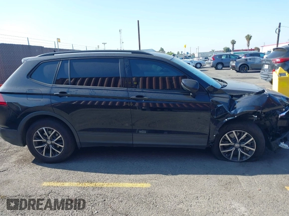 2021 Volkswagen Tiguan S with VIN 3VV1B7AX2MM142289, listed as a IAAI auction lot 42403346 with 71,182 mi miles and . Bid and sale history available at DreamBid. Image 13.