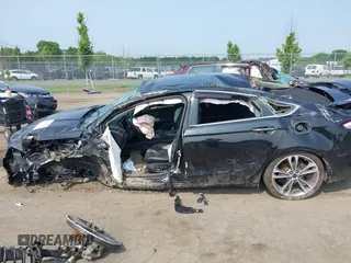2019 Ford Fusion Titanium with VIN 3FA6P0D92KR247270, listed as a IAAI auction lot 42474803 with Not provided miles and . Bid and sale history available at DreamBid. Image 13.