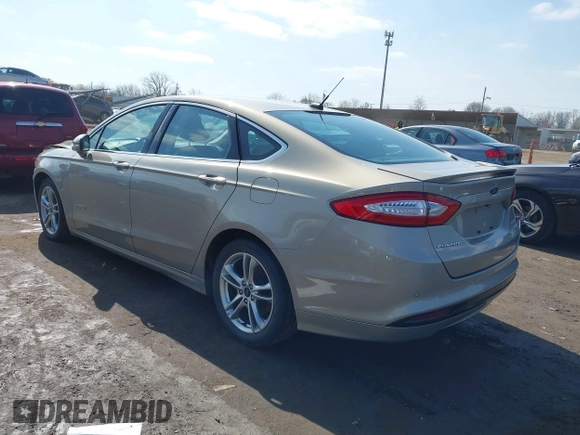2016 Ford Fusion Titanium Hybrid with VIN 3FA6P0RU5GR171287, listed as a IAAI auction lot 41918195 with 74,721 mi miles. Bid and sale history available at carsss.com. Image 3.