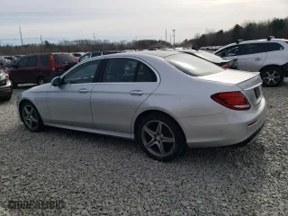 2017 Mercedes-Benz E-Class E 300 Luxury with VIN WDDZF4KB6HA105584, listed as a Copart auction lot 48584115 with 87,212 mi miles and Salvage Title. Bid and sale history available at carsss.com. Image 2.