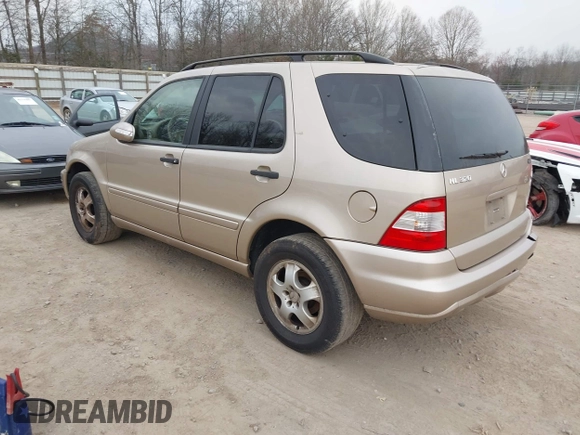 2002 Mercedes-Benz M 320/430/500 z VIN 4JGAB54E82A308902, wystawiony jako IAAI lot #41779482 z przebiegiem 99 933 mil mil oraz . Historia ofert i sprzedaży dostępna na DreamBid. Obrazek 3.