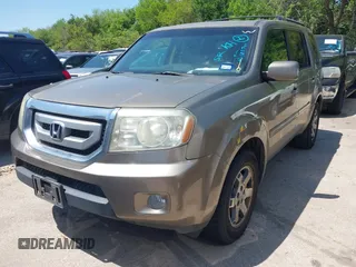 2011 Honda Pilot Touring with VIN 5FNYF4H94BB021952, listed as a IAAI auction lot 41985940 with 170,043 mi miles. Bid and sale history available at carsss.com. Image 16.