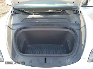 2024 Tesla Model Y Long Range с VIN 7SAYGDEE1RF201627, выставлен на аукционе Copart как лот 60631195 с пробегом 14 356 миль миль и Списание • Salvage title. История ставок и продаж доступна на DreamBid. Изображение 11.