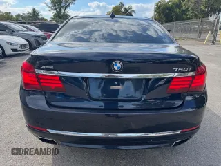 2015 BMW 7 Series 750i xDrive with VIN WBAYB6C5XFD965910, listed as a Copart auction lot 47488765 with 173,486 mi miles and Salvage Title. Bid and sale history available at carsss.com. Image 6.