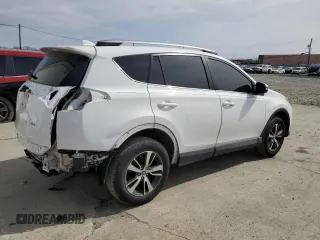 2018 Toyota RAV4 XLE with VIN 2T3WFREV2JW513054, listed as a Copart auction lot 48567645 with 65,227 mi miles and Salvage Title. Bid and sale history available at carsss.com. Image 3.