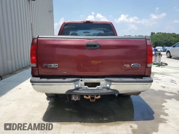 2000 Ford F-250 XL with VIN 1FTNX20L1YEB50589, listed as a Copart auction lot 63743775 with 105,448 mi miles and Salvage title. Bid and sale history available at DreamBid. Image 6.