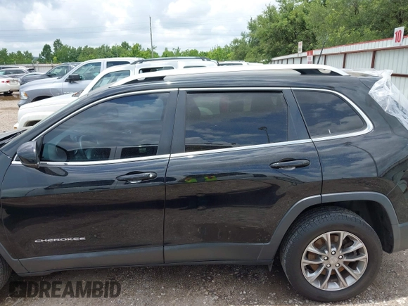2019 Jeep Cherokee Latitude Plus with VIN 1C4PJLLX9KD333220, listed as a IAAI auction lot 42512218 with 81,064 mi miles and . Bid and sale history available at DreamBid. Image 14.
