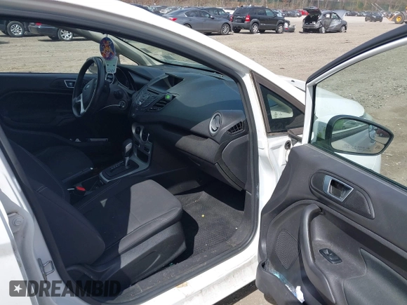 2016 Ford Fiesta SE with VIN 3FADP4EJ0GM147325, listed as a IAAI auction lot 42050497 with 63,349 mi miles and . Bid and sale history available at carsss.com. Image 5.