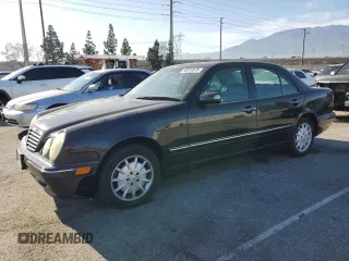 2001 Mercedes-Benz E-Class with VIN WDBJF65J21B365890, listed as a Copart auction lot 50519975 with 110,541 mi miles and Salvage Title. Bid and sale history available at carsss.com. Image 1.