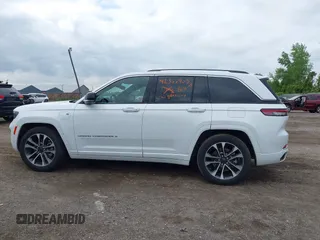 2022 Jeep Grand Cherokee Overland z VIN 1C4RJYD60N8717511, wystawiony jako IAAI lot #42366903 z przebiegiem 43 844 mil mil oraz . Historia ofert i sprzedaży dostępna na DreamBid. Obrazek 14.