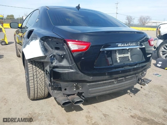 2015 Maserati Ghibli with VIN ZAM57XSA9F1146055, listed as a IAAI auction lot 41814633 with 88,783 mi miles. Bid and sale history available at carsss.com. Image 6.