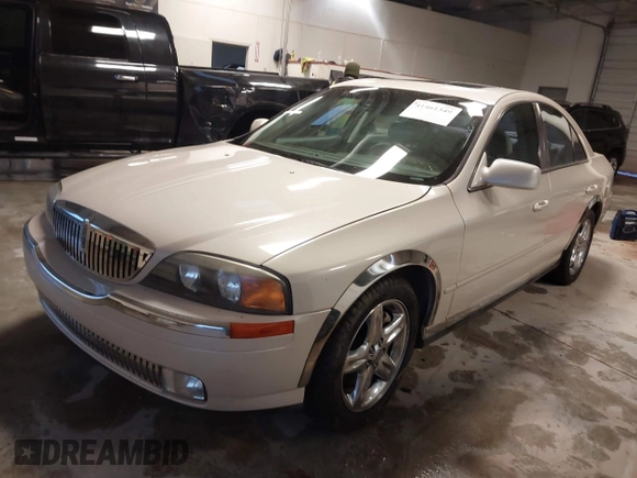 2002 Lincoln LS w/Base Pkg z VIN 1LNHM87AX2Y620293, wystawiony jako IAAI lot #41461349 z przebiegiem 129 295 mil mil oraz . Historia ofert i sprzedaży dostępna na DreamBid. Obrazek 14.