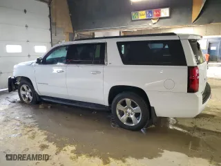 2020 Chevrolet Suburban LT with VIN 1GNSKHKC2LR187449, listed as a Copart auction lot 45943195 with 100,559 mi miles and Salvage Title. Bid and sale history available at carsss.com. Image 2.