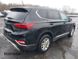 2019 Hyundai Santa Fe SE with VIN 5NMS23AD8KH008680, listed as a IAAI auction lot 42023218 with 67,745 mi miles and . Bid and sale history available at DreamBid. Image 4.