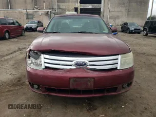 2008 Ford Taurus SEL with VIN 1FAHP24WX8G159335, listed as a Copart auction lot 74106694 with 187,710 mi miles and Salvage Title. Bid and sale history available at carsss.com. Image 5.