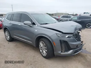 2021 Cadillac XT6 Luxury with VIN 1GYKPAR42MZ137548, listed as a IAAI auction lot 41630991 with 23,793 mi miles. Bid and sale history available at carsss.com. Image 1.