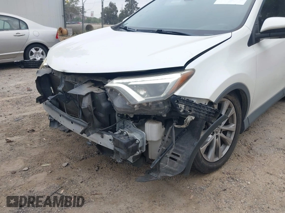 2016 Toyota RAV4 Limited with VIN JTMYFREV2GJ065656, listed as a IAAI auction lot 42575320 with 124,648 mi miles and . Bid and sale history available at DreamBid. Image 6.