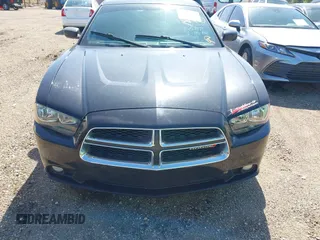 2014 Dodge Charger SXT with VIN 2C3CDXHG2EH369350, listed as a IAAI auction lot 41657478 with 120,566 mi miles. Bid and sale history available at carsss.com. Image 6.