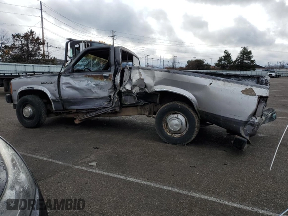 1989 Dodge Dakota S z VIN 1B7GL26X9KS129335, wystawiony jako Copart lot #82744003 z przebiegiem 174 152 mil mil oraz Szkoda całkowita • Salvage title. Historia ofert i sprzedaży dostępna na DreamBid. Obrazek 2.