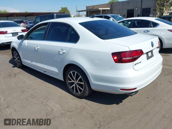 2017 Volkswagen Jetta SE with VIN 3VWDB7AJ7HM209222, listed as a IAAI auction lot 42655859 with 127,468 mi miles and . Bid and sale history available at DreamBid. Image 3.