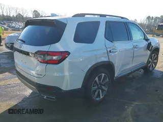 2024 Honda Pilot Touring with VIN 5FNYG2H7XRB016877, listed as a IAAI auction lot 41496013 with 18,213 mi miles and . Bid and sale history available at DreamBid. Image 4.