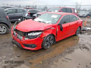2016 Honda Civic Sedan EX-T with VIN 2HGFC1F3XGH635159, listed as a IAAI auction lot 41584768 with 108,814 mi miles. Bid and sale history available at carsss.com. Image 2.