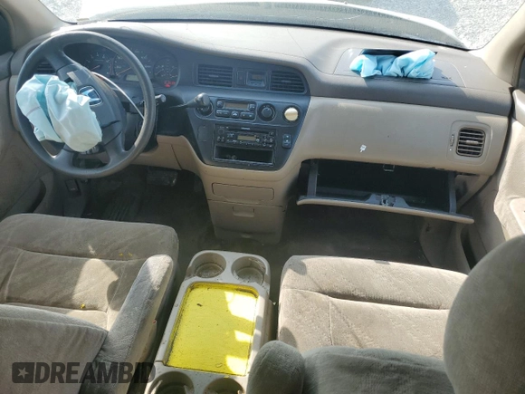 2002 Honda Odyssey EX with VIN 2HKRL18612H503328, listed as a Copart auction lot 52699095 with 241,741 mi miles and Salvage title. Bid and sale history available at DreamBid. Image 8.
