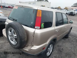 2000 Honda CR-V SE with VIN JHLRD1877YS023555, listed as a IAAI auction lot 41625009 with 164,000 mi miles. Bid and sale history available at carsss.com. Image 4.