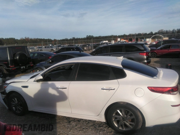 2019 Kia Optima LX with VIN 5XXGT4L36KG344923, listed as a IAAI auction lot 41101973 with 153,350 mi miles and . Bid and sale history available at DreamBid. Image 14.