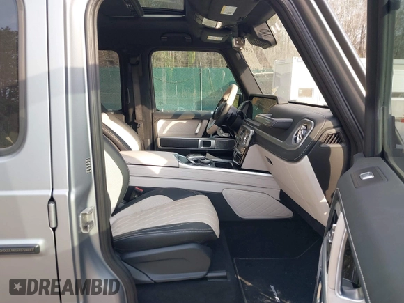 2023 Mercedes-Benz G 550 with VIN W1NYC6BJ4PX486695, listed as a IAAI auction lot 41638507 with 8,678 mi miles and . Bid and sale history available at DreamBid. Image 5.