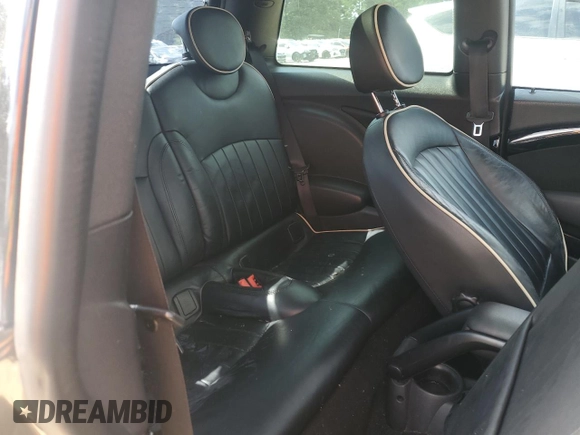 2012 MINI Hardtop S with VIN WMWSV3C50CTY18637, listed as a Copart auction lot 57771015 with 103,402 mi miles and Salvage title. Bid and sale history available at DreamBid. Image 10.