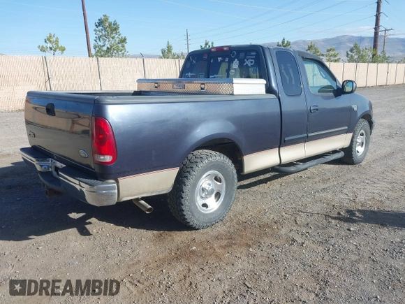 1999 Ford F-150 XL with VIN 1FTRX17L5XKB39130, listed as a IAAI auction lot 42041520 with Not Provided miles. Bid and sale history available at carsss.com. Image 4.