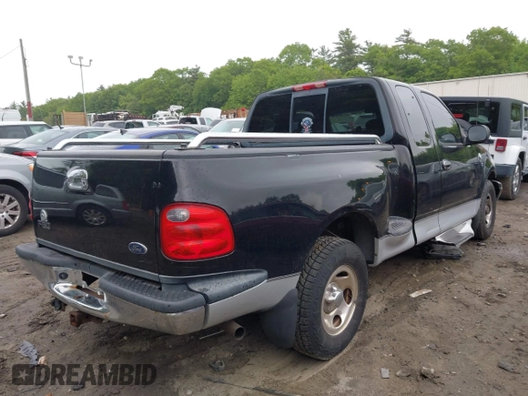 2003 Ford F-150 XL with VIN 1FTRX07W73KD29879, listed as a IAAI auction lot 42356048 with Not provided miles and . Bid and sale history available at DreamBid. Image 4.