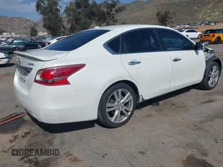 2013 Nissan Altima SV with VIN 1N4BL3APXDN551757, listed as a IAAI auction lot 41663814 with 102,547 mi miles and . Bid and sale history available at DreamBid. Image 4.