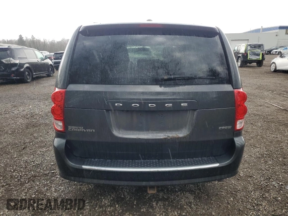2011 Dodge Grand Caravan Crew with VIN 2D4RN5DG2BR762738, listed as a Copart auction lot 49528955 with 203,748 mi miles and Clean Title. Bid and sale history available at DreamBid. Image 6.