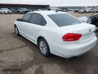 2014 Volkswagen Passat Wolfsburg Ed with VIN 1VWAS7A30EC119833, listed as a IAAI auction lot 41429589 with 181,630 mi miles. Bid and sale history available at carsss.com. Image 3.