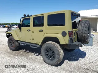 2013 Jeep Wrangler Unlimited Rubicon with VIN 1C4BJWFG0DL587057, listed as a Copart auction lot 57362535 with 102,684 mi miles and Salvage title. Bid and sale history available at DreamBid. Image 2.