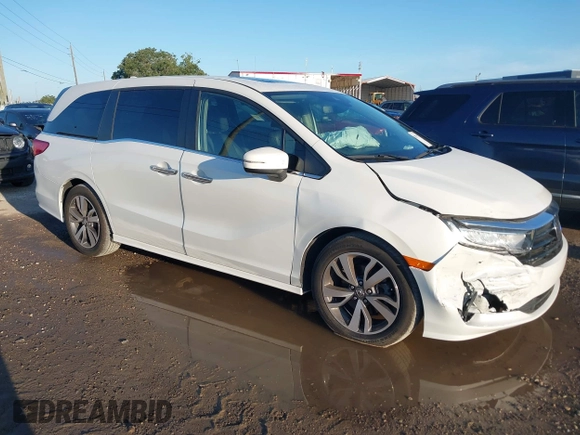 2022 Honda Odyssey Touring with VIN 5FNRL6H85NB058948, listed as a IAAI auction lot 42579157 with 53,669 mi miles and . Bid and sale history available at DreamBid. Image 1.