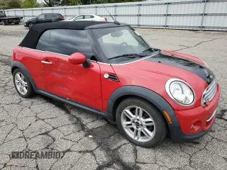 2011 MINI Convertible with VIN WMWZN3C51BTZ78331, listed as a Copart auction lot 73348304 with 94,219 mi miles and Salvage title. Bid and sale history available at DreamBid. Image 4.