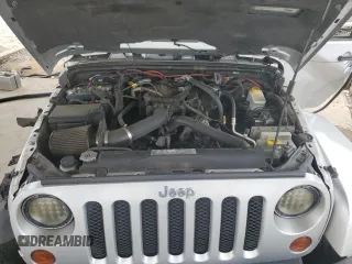 2011 Jeep Wrangler Sahara with VIN 1J4AA5D13BL546742, listed as a Copart auction lot 56415765 with 60,454 mi miles and Salvage title. Bid and sale history available at DreamBid. Image 11.