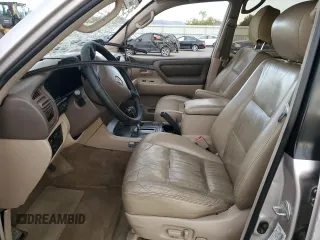 2000 Toyota Land Cruiser z VIN JT3HT05J4Y0088451, wystawiony jako Copart lot #52208905 z przebiegiem 329 751 mil mil oraz Nie do naprawy • Non repairable. Historia ofert i sprzedaży dostępna na DreamBid. Obrazek 7.