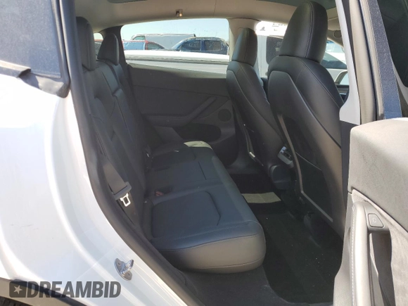 2022 Tesla Model Y Long Range with VIN 7SAYGDEE7NA012634, listed as a Copart auction lot 49206295 with 19,267 mi miles and Clean Title. Bid and sale history available at DreamBid. Image 10.