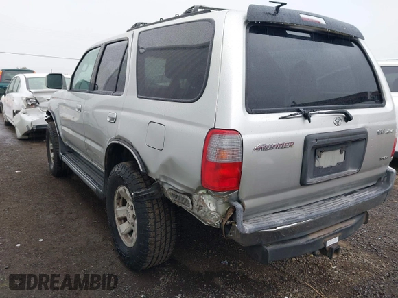 1999 Toyota 4Runner SR5 with VIN JT3HN86RXX0232435, listed as a IAAI auction lot 41473618 with 267,054 mi miles and . Bid and sale history available at DreamBid. Image 3.