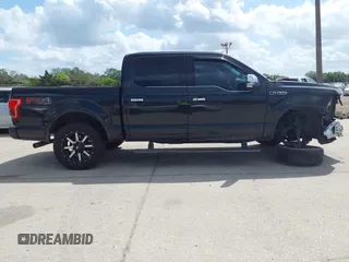 2015 Ford F-150 XLT with VIN 1FTEW1EF4FFC52928, listed as a IAAI auction lot 41994726 with 211,628 mi miles. Bid and sale history available at carsss.com. Image 14.