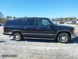 1999 Chevrolet Suburban with VIN 3GNEC16R0XG137834, listed as a IAAI auction lot 41853492 with 296,147 mi miles. Bid and sale history available at carsss.com. Image 13.