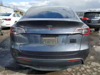 2021 Tesla Model Y Long Range with VIN 5YJYGAEE4MF200914, listed as a Copart auction lot 46946845 with 116,370 mi miles and Salvage Title. Bid and sale history available at DreamBid. Image 6.