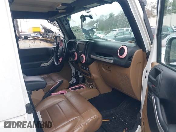 2011 Jeep Wrangler Sahara with VIN 1J4AA5D15BL538240, listed as a IAAI auction lot 41793836 with 172,528 mi miles and . Bid and sale history available at carsss.com. Image 5.