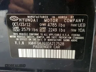 2013 Hyundai Azera z VIN KMHFG4JG1DA217528, wystawiony jako Copart lot #56123655 z przebiegiem 148 606 mil mil oraz Szkoda całkowita • Salvage title. Historia ofert i sprzedaży dostępna na DreamBid. Obrazek 13.