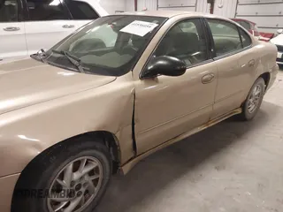 2004 Pontiac Grand Am SE1 with VIN 1G2NF52E04M704082, listed as a IAAI auction lot 41536059 with 207,958 mi miles. Bid and sale history available at carsss.com. Image 6.